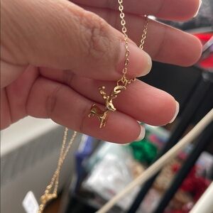 Elegant Gold Reindeer Pendant Necklace